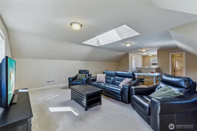 There is a 3/4 bathroom on the third level off the bonus room.