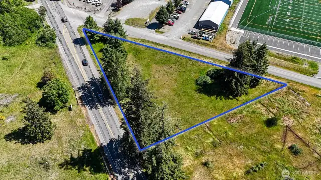 Talk with the City of Yelm about how you can build your investment portfolio by developing this bare land parcel. Blue boundary lines are approximate. Buyer to verify to their own satisfaction.