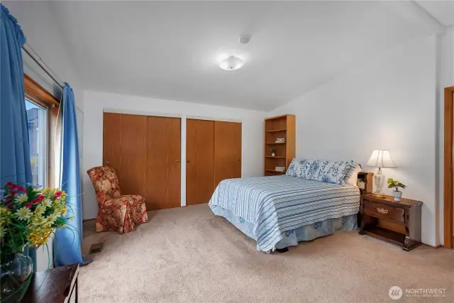 Over-sized primary bedroom with lots of closet space