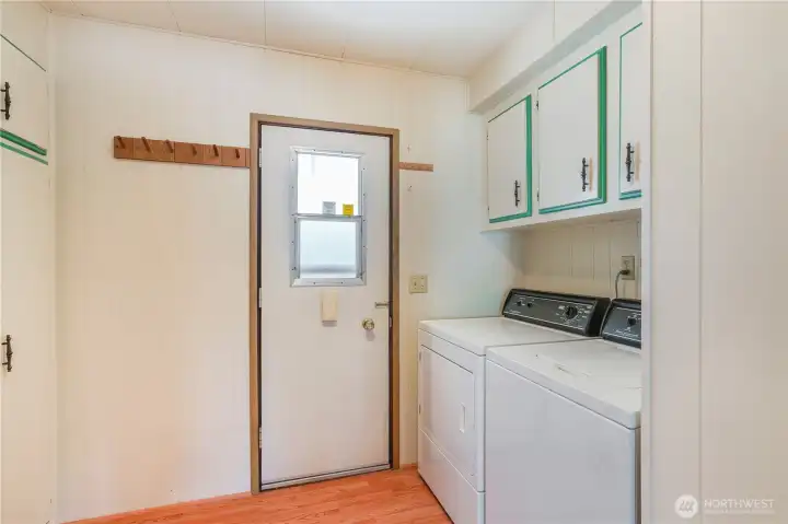 Washer and dryer off of the entry way