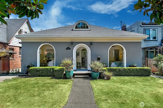 All of the arched windows are doors! So sweet and airy!