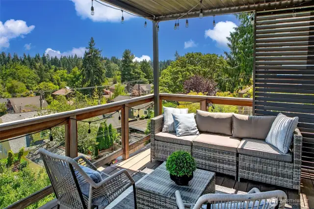 Excellent deck is huge and expansive to take in the views. This section is covered for all weather enjoyment.