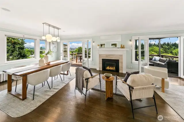 Living room spans the entire width of the house with 180 degree views of the Cascades, Arboretum and Lake Washington.