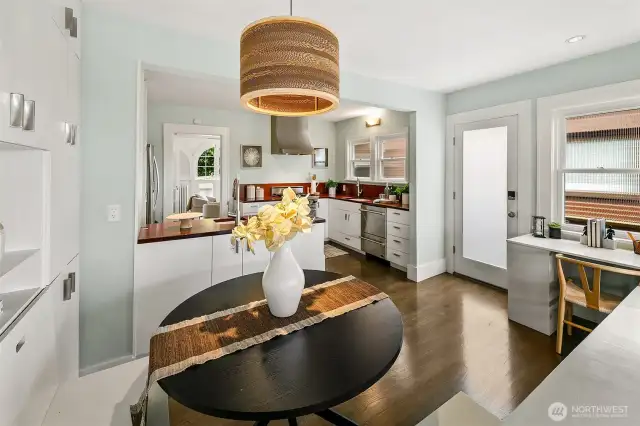 Perspective from the breakfast nook towards the kitchen and office.