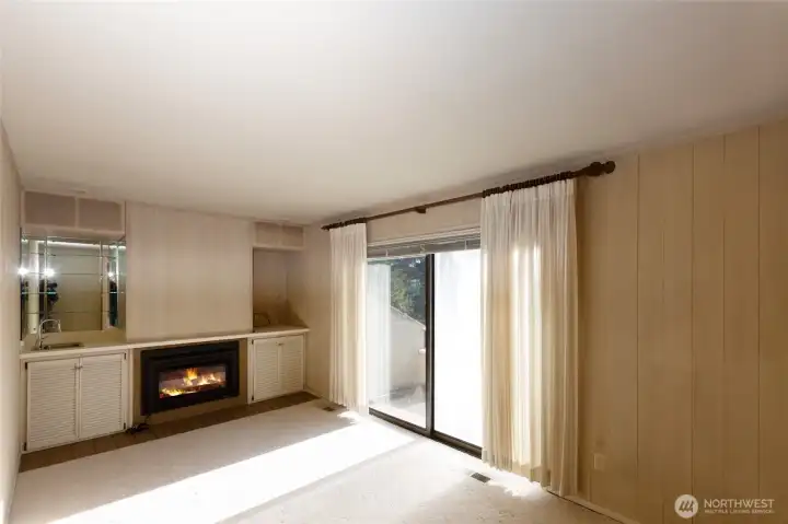 Den with fireplace