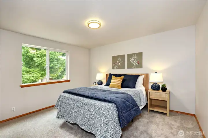 Upper level bedroom w/views of the back yard.