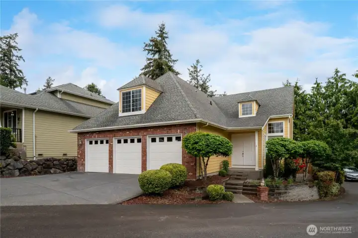 Nicely situated on a corner lot with extra driveway parking.