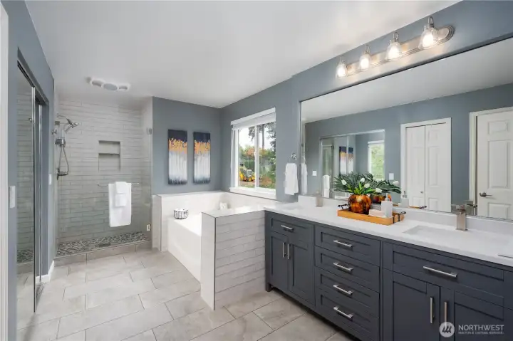 The primary bathroom was recently given a facelift for a very contemporary vibe.