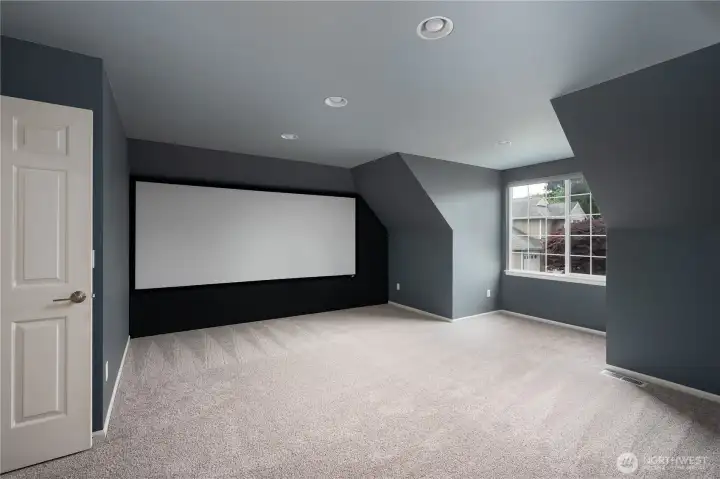 Super spacious media room located on the 2nd floor. Screen remains.