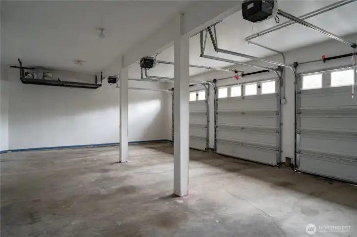3-car garage pre-wired for up to 2 EV vehicles.