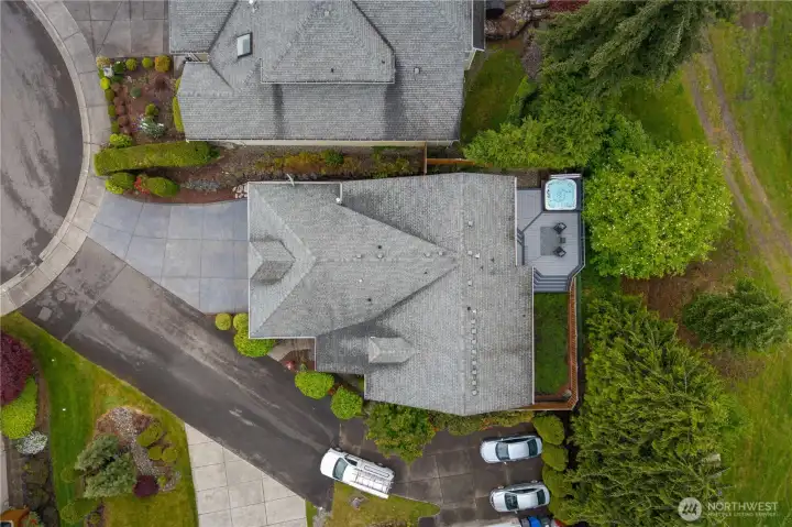 The driveway below is an easement for accessing the two neighbors.