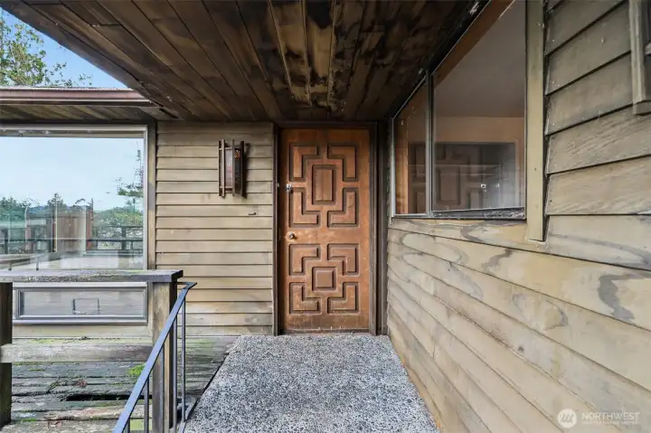 Featuring a 2-car garage and solid bones, this property is ideal for renovation and customization