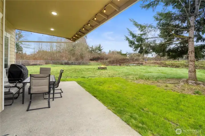 Covered Patio and a fire pit are ready for your outdoor enjoyment.