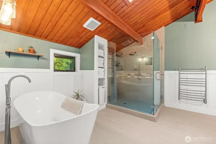 Thoughtful amenities abound—the heated towel rack and under-floor heating transform this primary bath into a true restorative sanctuary.