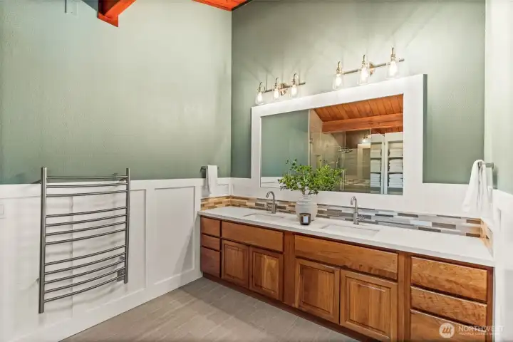 A natural refresh. The intricate tile work adds a sophisticated, modern edge to the primary suite’s organic architectural soul.