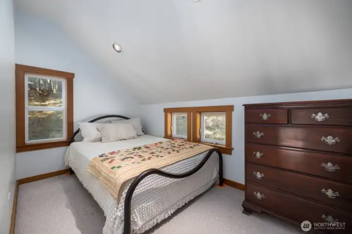 Second bedroom on upper loft floor.