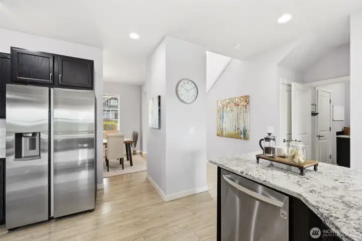 A stunning photo of light dancing with shadows, sharp lines and soft colors. This home provides a warm feeling throughout.