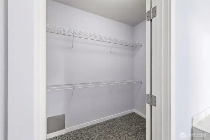 Primary suite walk-in closet.