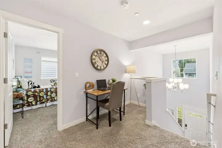 An open landing on the upper floor provides flexibility.