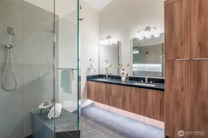 Huge primary bath suite with heated tile floors, custom tile