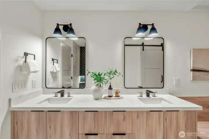 Double vanities in shared bathroom.