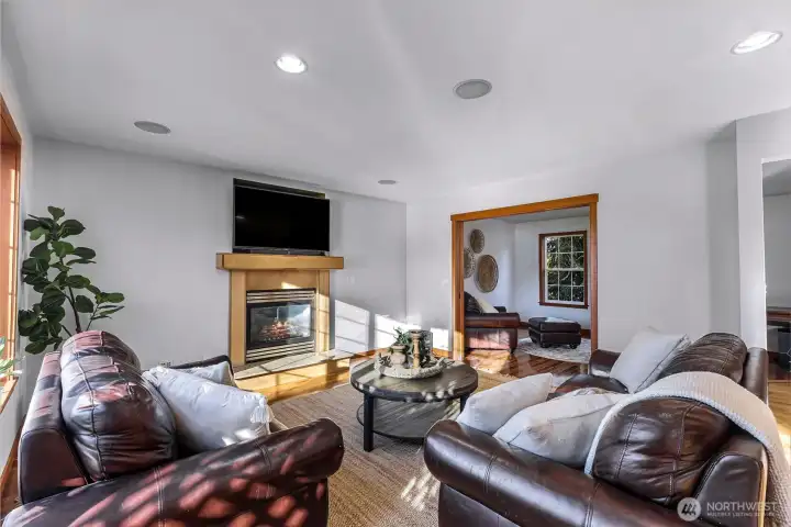 Additional living room view reinforces the  openness and warmth of the main floor.  Ideal for hosting or quiet evenings alike.