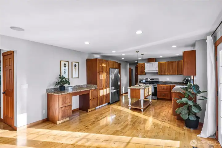 Kitchen overview highlights central  placement within the home, making it a true  hub for daily life. Efficient design supports  both cooking and connection.
