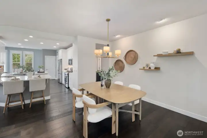 Large Dining area with updated lighting