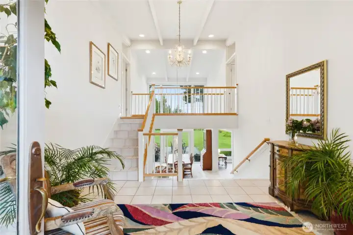 Large foyer with garage access to the right (door into garage not shown in this photo).