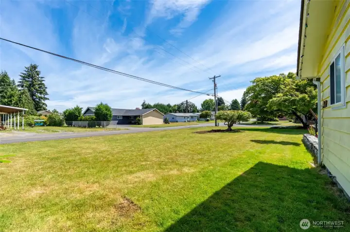 Front yard on .32-acres corner lot. Front yard on .32-acres corner lot.