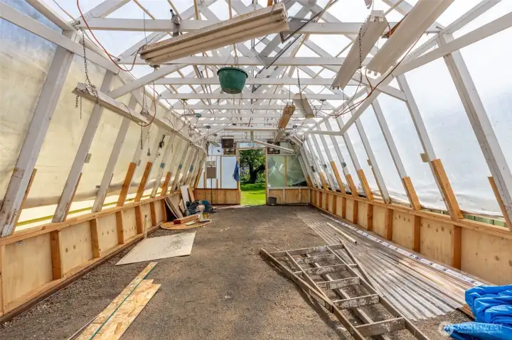 Large Greenhouse ready to support your love of plants. Large Greenhouse ready to support your love of plants.