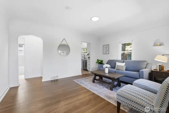 Beautiful hardwood floors and arched walkways throughout the main level. Beautiful hardwood floors and arched walkways throughout the main level.