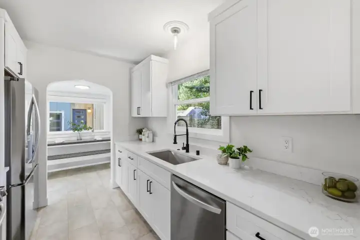 Kitchen was just remodeled with quartz countertops and undermount sink. Kitchen was just remodeled with quartz countertops and undermount sink.