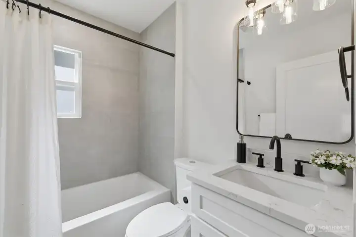 Remodeled full bathroom on the main level. Remodeled full bathroom on the main level.