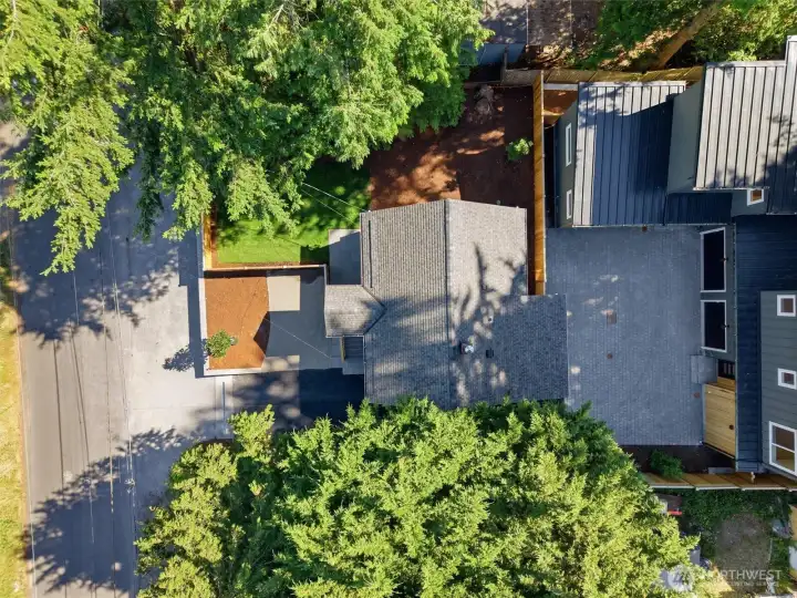 Aerial shot showing this home in the center with side yard near the top of this photo. Two new construction homes just completed behind this house. Aerial shot showing this home in the center with side yard near the top of this photo. Two new construction homes just completed behind this house.