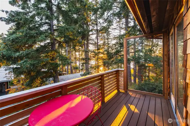 Side porch with views out to the water.