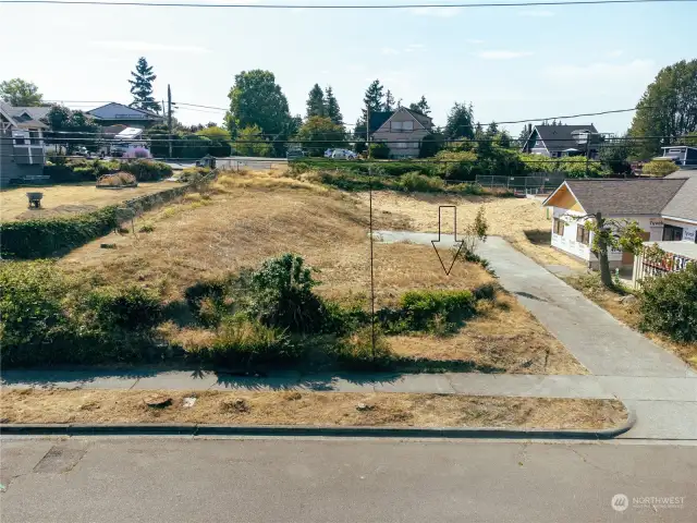 Ready to build, sewer & water hookups on property.  Electric in street, possibly an exception may be granted to hook onto pole for electric