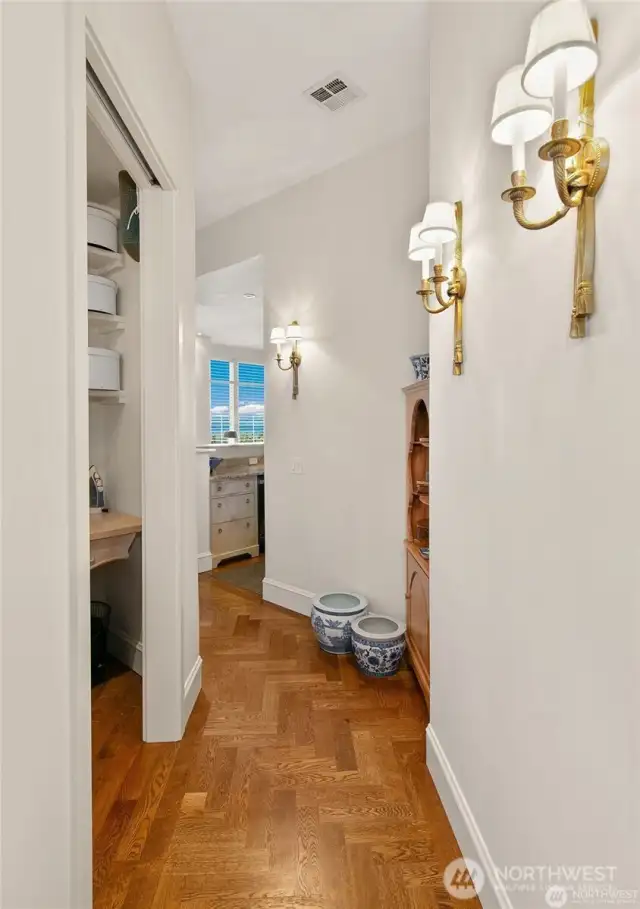 herring bone wood floors upon entry