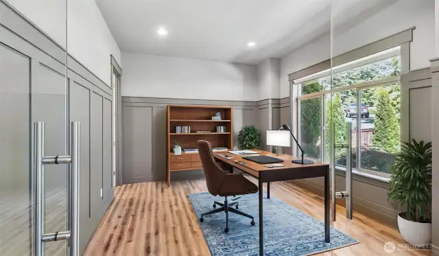 Great main floor office with glass doors, virtual staging.