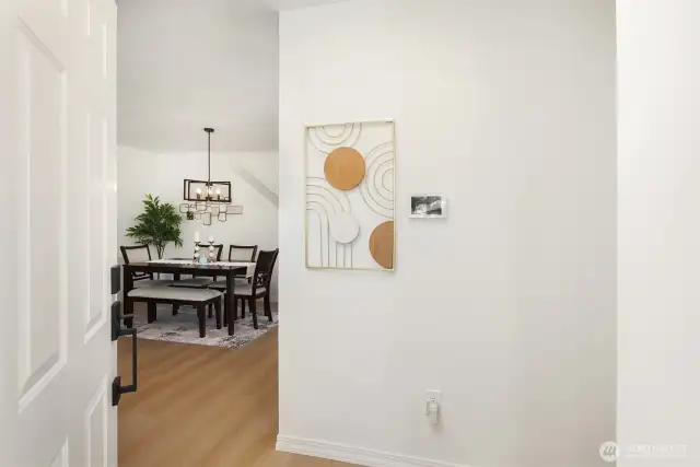 Entry Looking to Living Room & Dining Area