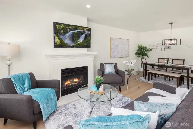 Living Room & Dining Area w/ Gas Fireplace w/Quartz Surround & Hearth