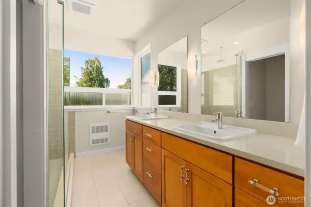 Primary bathroom with great storage space & dual sinks