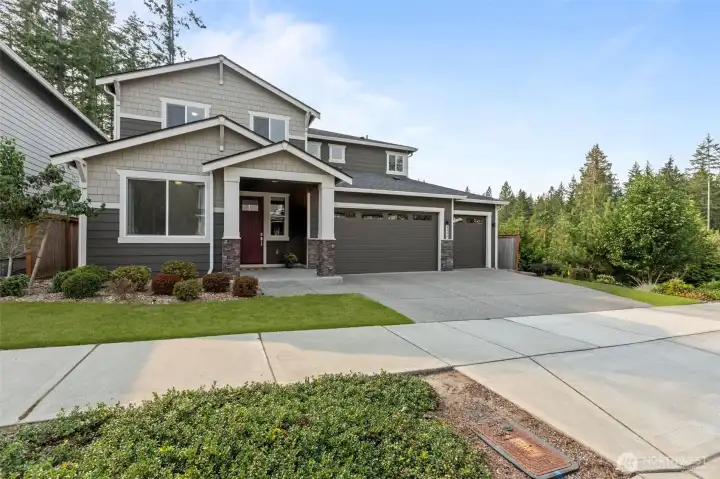 Gorgeous Century Home on a sought after corner lot in Amherst! Three car garage and ample privacy.