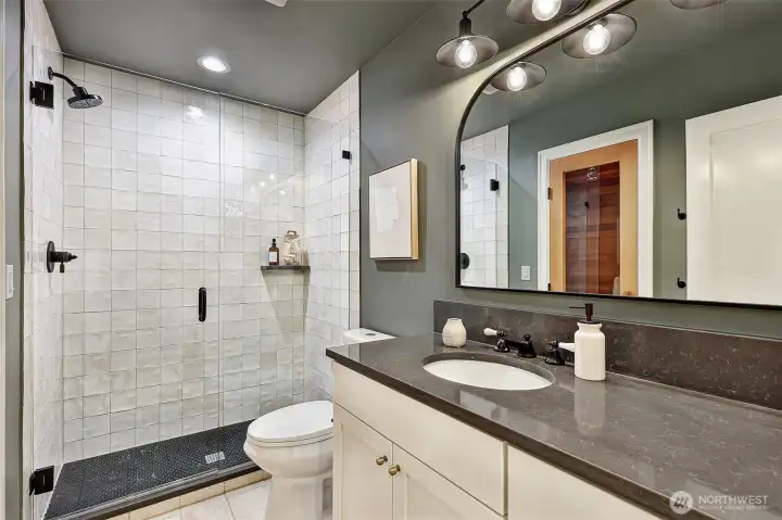 3/4 bath on lower level includes a beautiful sauna.