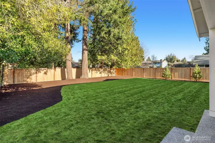 Large, Level, and fenced backyard with great Privacy