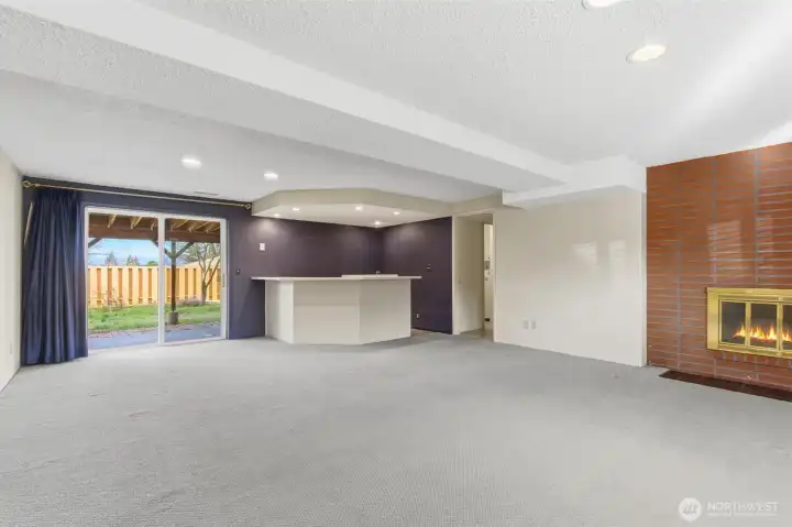 The fireplace in the recreation room adds warmth on colder Pacific Northwest days