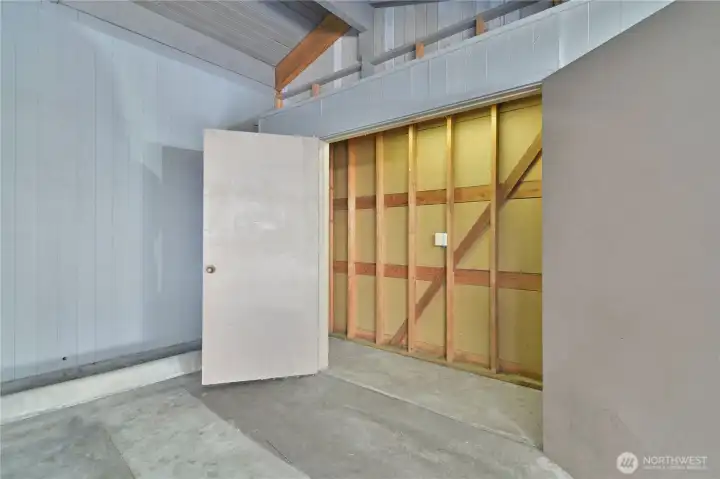 Spacious secure storage unit in carport