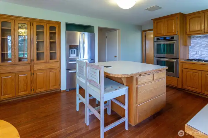 Kitchen Island and Beautiful oak dish cabinet