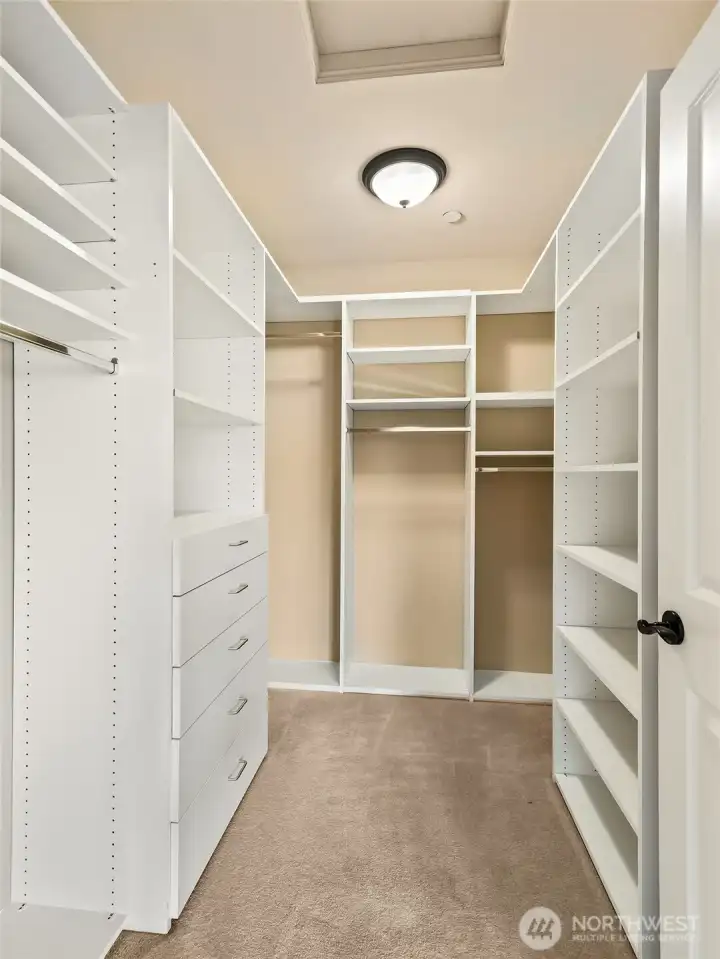 First primary suite walk-in closet.