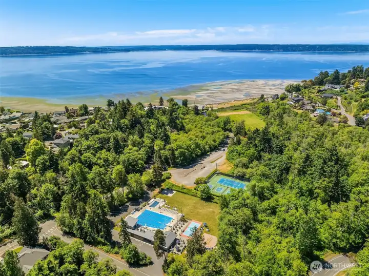 The Cove: a natural sanctuary with tennis courts, trails, picnic tables and 700' of private community beach.